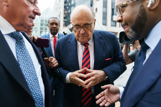 Giuliani arrived at the Fulton County Courthouse on Wednesday 