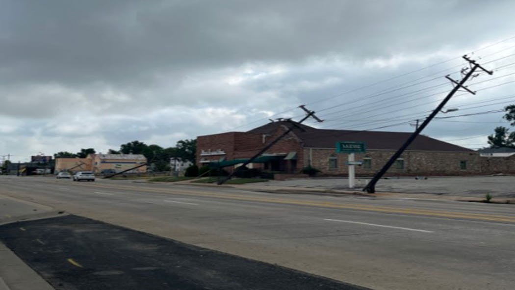 PHOTOS Uprooted Trees, Damaged Homes & Downed Power Lines Seen In