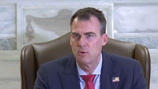 Gov. Stitt Writes Letter Vouching For Oklahoma Couple Arrested in Turks And Caicos